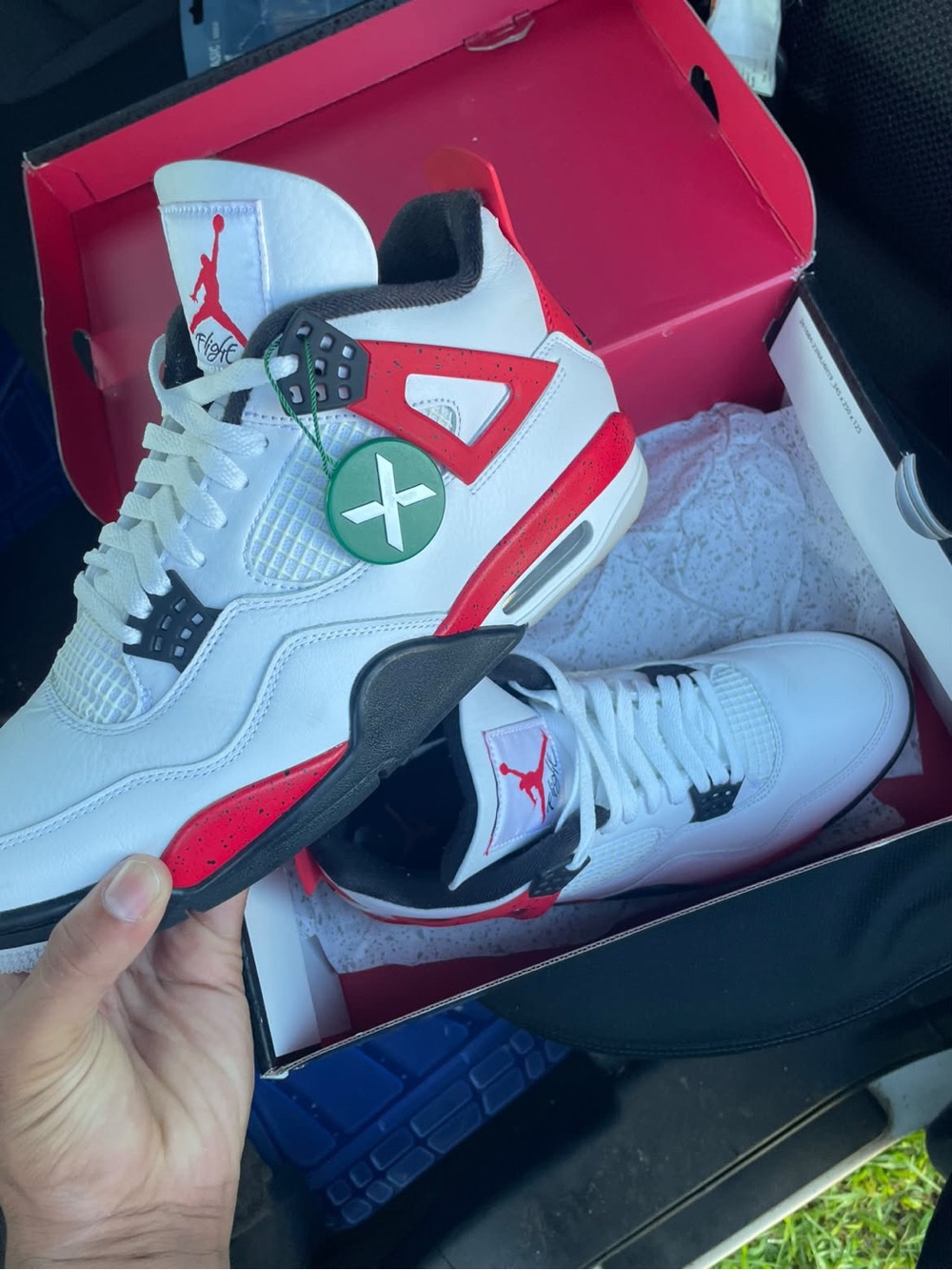 Jordan 4 Retro
Red Cement